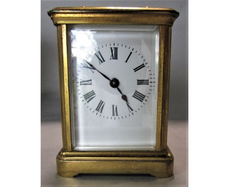 A small brass cased carriage clock 