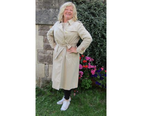 Burberry classic ladies trench coat, cream with tartan lining, with double breasted button fastening, belt. No size label; ba