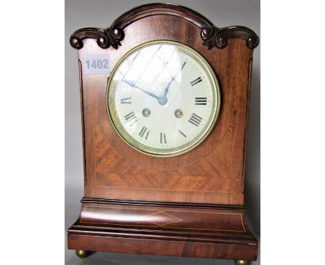 Early 20th century walnut and kingwood inlaid mantel clock, the enamel dial with Roman numerals and twin train movement, 31cm