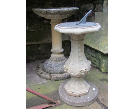 A reclaimed three sectional bird bath of circular form, the top 40 cm in diameter x 60 cm high, together with a small composi