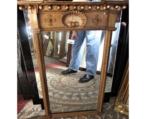 A Regency gilded overmantle mirror with bobbin and shell detail 