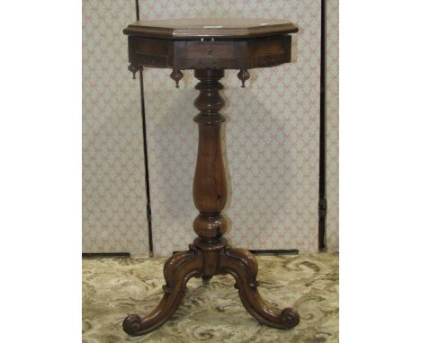 A Victorian rosewood occasional table of octagonal form with rising lid, revealing a shallow interior, raised on a vase shape