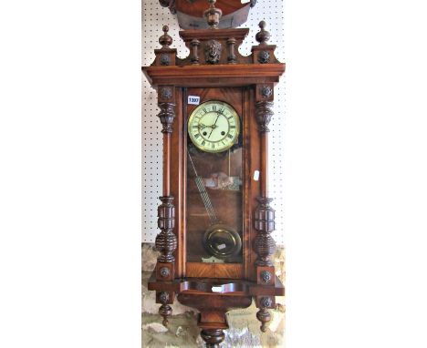 Vienna Biedermeier type wall clock, the fancy enamel dial with Roman numerals, twin train movement, 100cm high, pendulum 