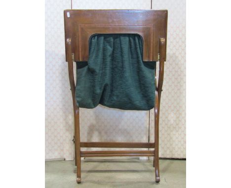 A late 19th century campaign folding sewing table with inlaid satinwood banding, push button release with leather material li