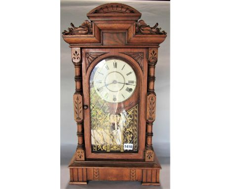 Vintage German gingerbread clock, with typical painted steel dial, three train movement and architectural case, 57 cm high, k