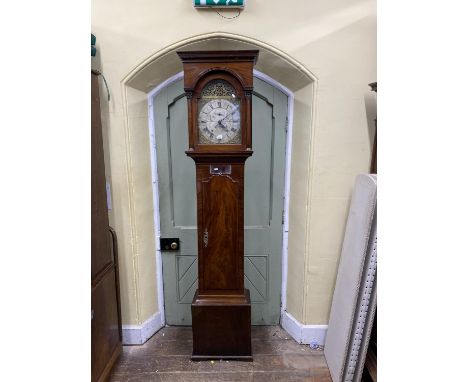 A Georgian mahogany longcase clock, the hood with column supports beneath a dentil frieze exposing broken arch dial with silv