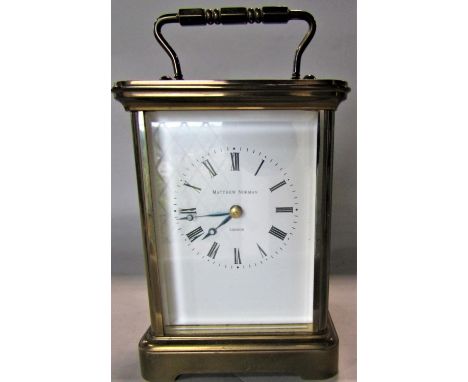 Good quality brass cased carriage clock by Matthew Norman of London, striking on a gong, 13.5 cm high, key 