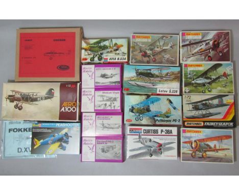 17 model aircraft kits of 1930's aeroplanes, all unchecked and appear to be un-started, including models by Matchbox, KP, Mon