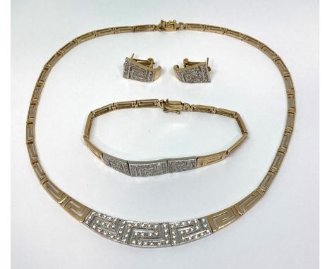 Suite of 14ct bi-colour jewellery with pierced Greek key decoration set with white stones, comprising necklace, bracelet and 
