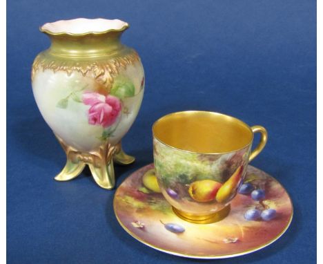 A Royal Worcester cabinet cup and saucer with finely painted fruit, the cup signed Ricketts, the saucer signed Cole, cup diam