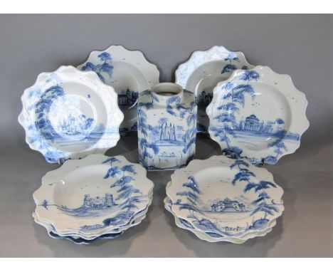 Collection of eleven hand painted plates in the 18th century Delft manner with individual building and landscape detail, toge
