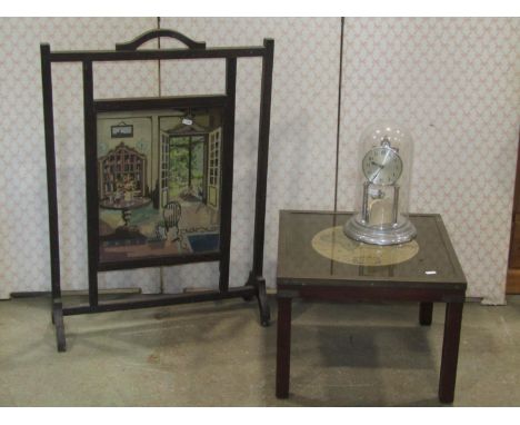 A oak framed fire screen enclosing a tapestry panel together with a small reproduction military style occasional table with b