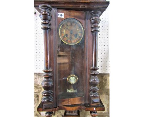 Small Vienna type Biedermeier wall clock, the twin train dial with enamel chapter ring, Roman numerals, pendulum and key 