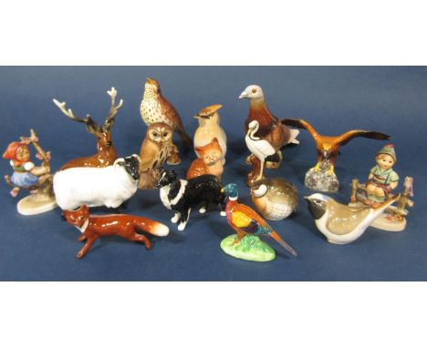 A collection of Beswick and other model animals and birds including a Beswick sheep, sheep dog, fox, pheasant, a thrush and a