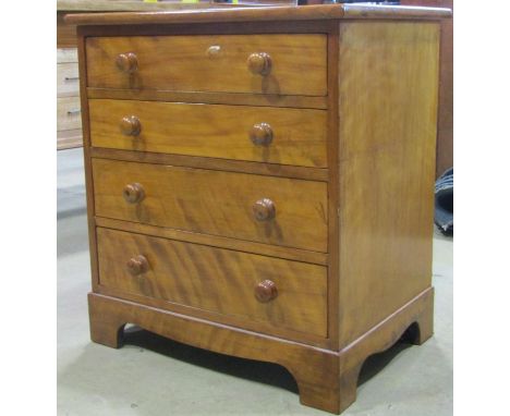 A 19th century satin walnut chest of four long graduated drawers on bracket supports, 65cm wide x 71cm high x 48cm deep 