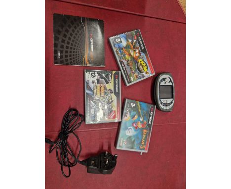 A Nokia N-Gage games console and telephone together with three games