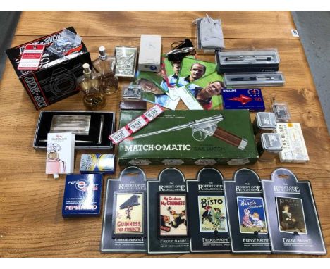 Miscellaneous collectable items: Jean Paul Gaultier scent bottles, Guinness fridge magnets, a Centon camera, Parker pens, a M
