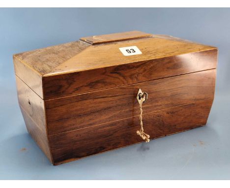A 19th C. line inlaid rosewood sarcophagus tea caddy, the interior with two canisters flanking the mixing bowl receiver