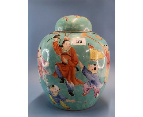 A Chinese turquoise ground jar and cover painted with boys processing and dancing, four character seal mark.   H 26cms