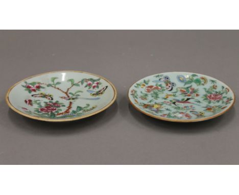 A pair of small 19th century Chinese famille rose plates, painted with birds, butterflies and flowers. 14 cm diameter.