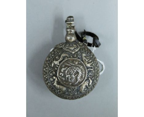 A Tibetan unmarked silver snuff bottle. 9.5 cm high.