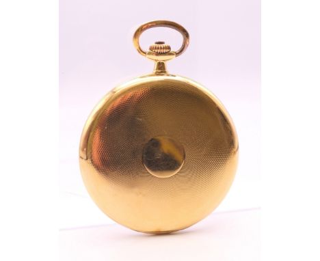 A Movado 18 K gold pocket watch.  5.5 cm diameter. 89 grammes total weight.