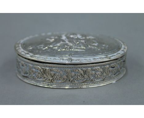 An 800 silver embossed box. 7.5 cm wide. 76.1 grammes.