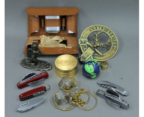 A quantity of miscellaneous items, including a silver plated cherub form vesta, a brass door knocker, various pen knives, a g