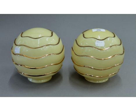 A pair of Art Deco glass lamp shades. 16 cm high.