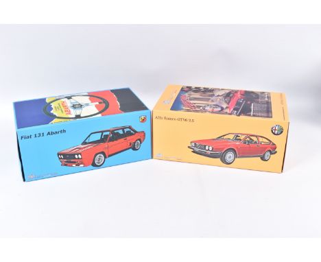 TWO BOXED LIMITED EDITION  LAUDORACING 1:18  SCALE  MODEL VEHICLES, the first is a Fiat 131 Abarth, numbered LM109C, in yello