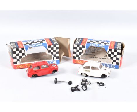TWO BOXED VINTAGE SCALEXTRIC RACE TUNED FIAT 600 CARS, No.C99, one in red red with RN20, the other white with RN26, both in p