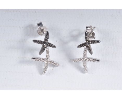 A PAIR OF 9CT GOLD DIAMOND SET EARRINGS, each designed as two crosses set with single cut black and colourless diamonds, to t