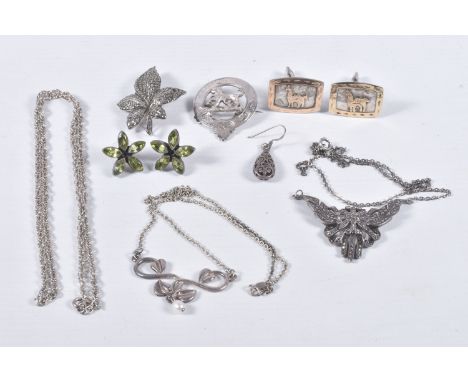 AN ASSORTMENT OF SILVER AND WHITE METAL JEWELLERY, to include a silver military badge, hallmarked Edinburgh, approximate gros