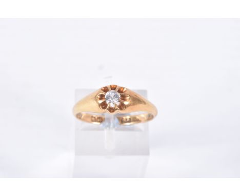 AN EARLY 20TH CENTURY, 18CT GOLD RING, centring on a circular cut colourless stone, assessed as spinel, in an eight claw sett