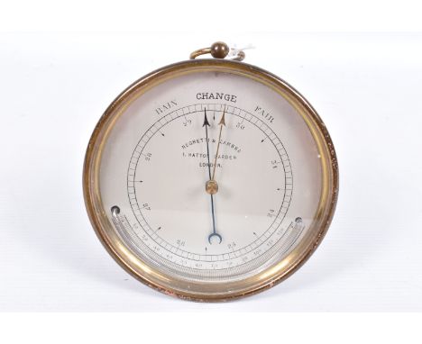 A NEGRETTI &amp; ZAMBRA BRASS CASED CIRCULAR BAROMETER, the silvered dial marked with 'RAIN CHANGE FAIR', thermometer and add