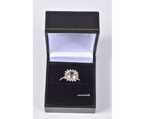 A 9CT GOLD GEM SET RING, a square cut light yellow quartz, set with a halo of single cut diamonds, hallmarked 9ct Birmingham,