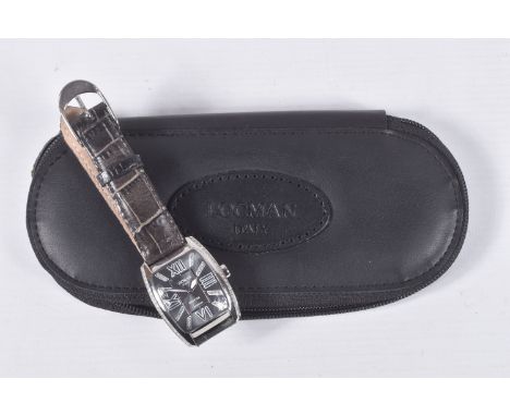 A 'LOCMAN ITALY' WRISTWATCH, quartz movement, silvered dial, signed 'Locman Italy, History Patented', alternating Roman numer