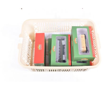 SIX BOXED  OO9 NARROW GAUGE BACHMANN BRANCHLINE MODEL WAGONS AND COACHES, to include a Steel Bodied Bogie Third Coach in Maro
