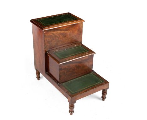 An early 19th century Regency mahogany step commode with leather inset lifting top pull out commode drawer and turned legs 44