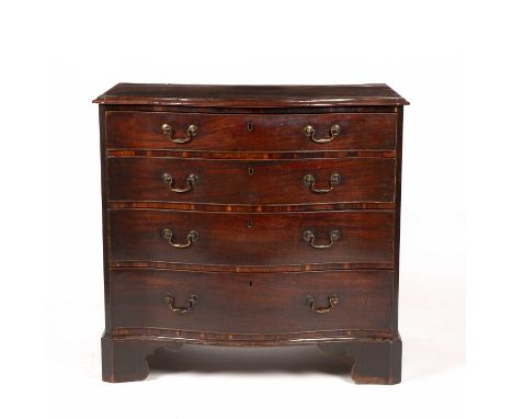 A George III mahogany serpentine chest of four long graduated drawers with brass swan neck handles and raised on bracket feet
