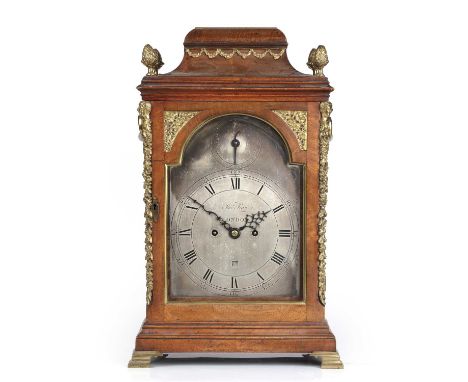 A George III mahogany bracket clock, the break arch silvered Roman dial signed Thomas Ray, London, date aperture and strike/s