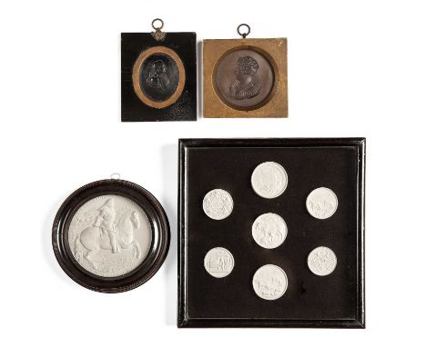 An early 19th century bronzed lead portrait roundel depicting Queen Caroline, 9.5cm diameter; together with a George III meta