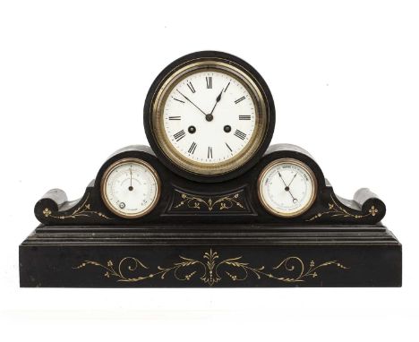 A 19th century French polished slate mantel clock with white enamel Roman dial, drum movement and bell strike. The drum and s