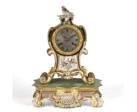 A 19th century porcelain mantel clock with silvered engine turned Roman dial, drum movement, outside countwheel bell strike a