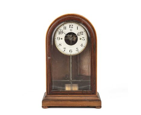 A Bulle mantle clock, the silvered Arabic dial with open centre and moon hands, retailed by G Commander, Leamington. The arch