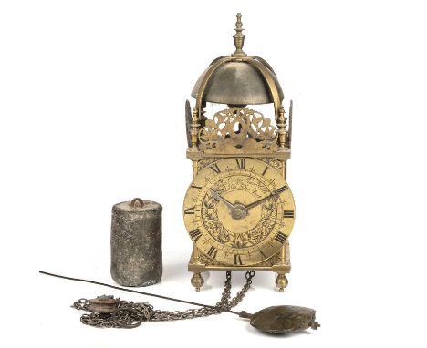 Nicholas Coxeter. A 17th century brass lantern clock, the Roman chapter ring with stylised fleur-de-lys half hour markers, th