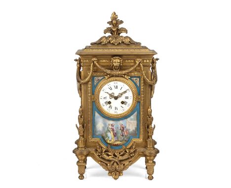A 19th century French Louis IV style gilt metal mantel clock, the white enamel convex Roman dial with Arabic five minutes, Ma