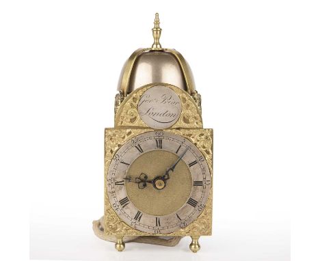 An 18th century hoop and spike lantern clock by George Prior the slivered chapter ring with roman and arabic numerals having 