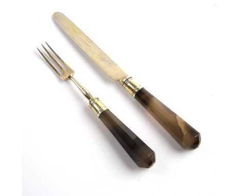 An early 19th century silver gilt knife and fork by Moses Brent of London with hardstone handles the knife 24cm .Knife handle