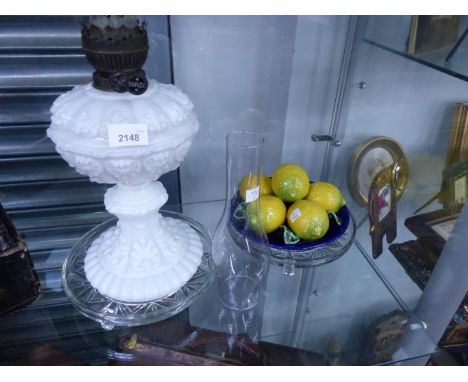 AN ANTIQUE OPAQUE GLASS OIL LAMP, PAIR OF GLASS DISHES AND POTTERY LEMONS.